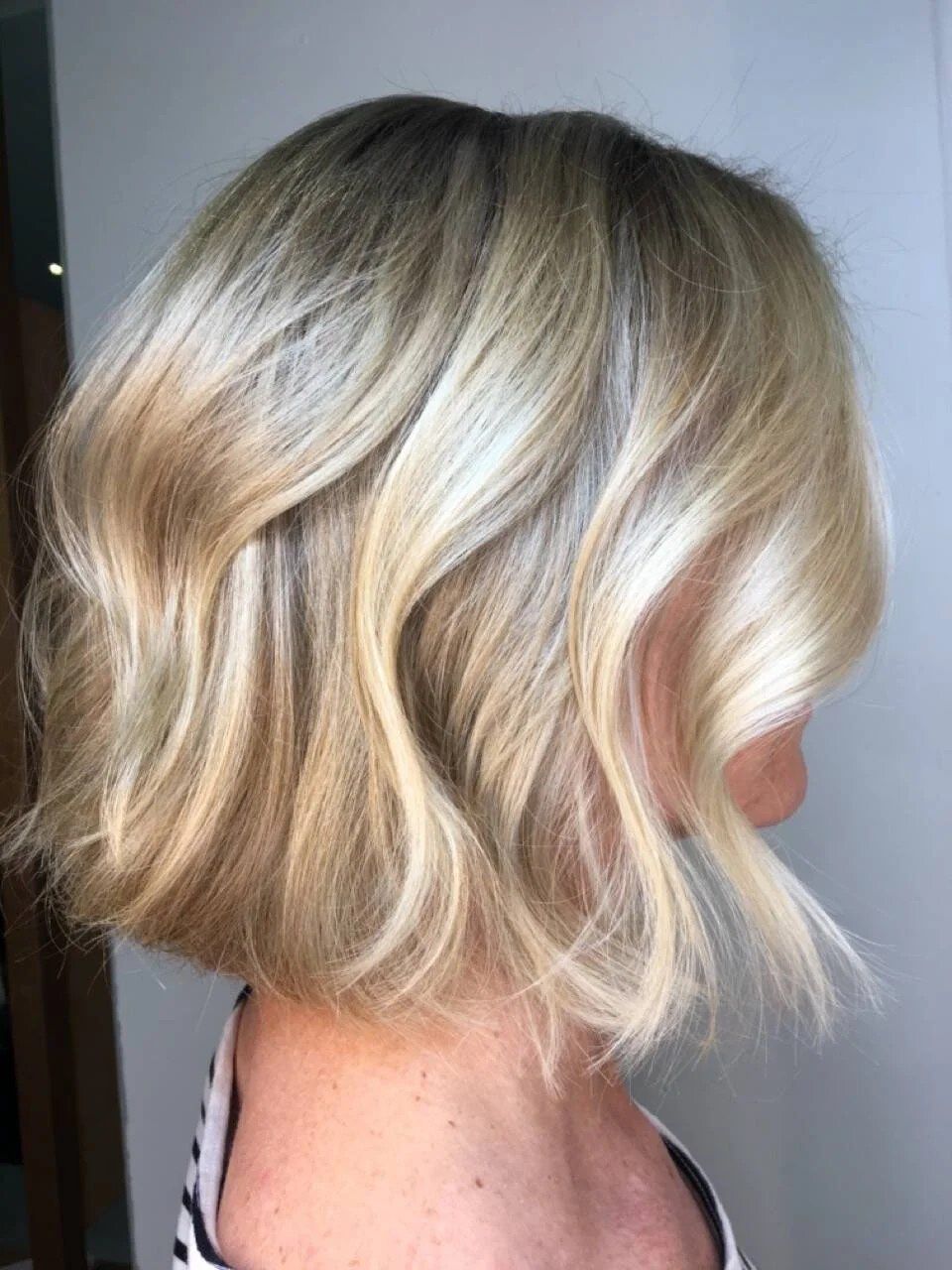 Textured blonde bob with bright, dimensional highlights
